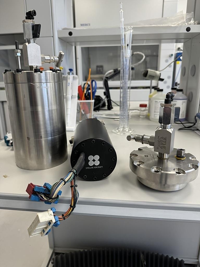 Prototype cartridge alongside laboratory test housings