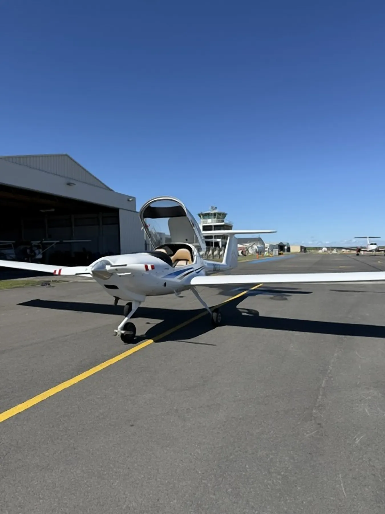 2010 Diamond DA20-C1 Eclipse ZK-WUJ, side profile exterior view
