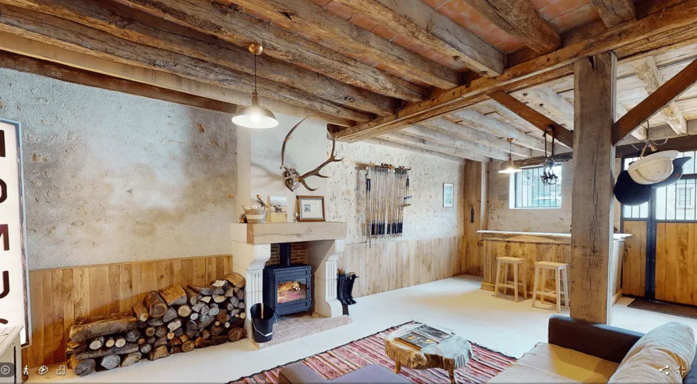 Espace détente et lounge du gîte du Grand Breuil - Idéal pour les réunions en petit comité