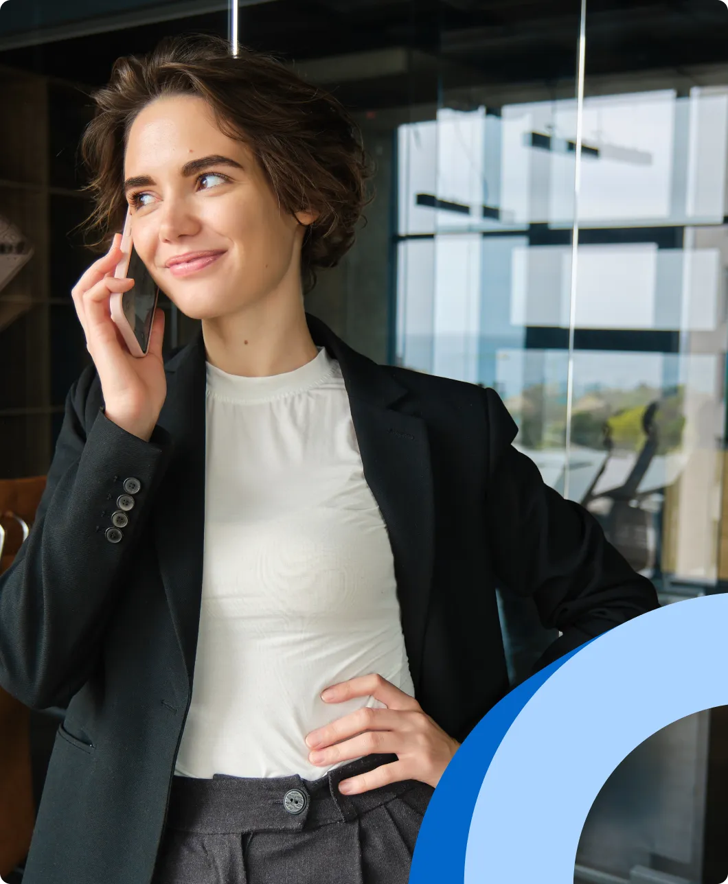 A businesswoman talking on the phone with a client