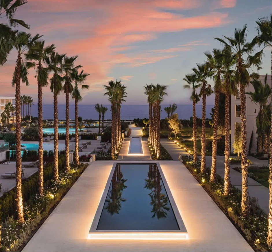 A sunset photo from the pool area of Ikos Resorts