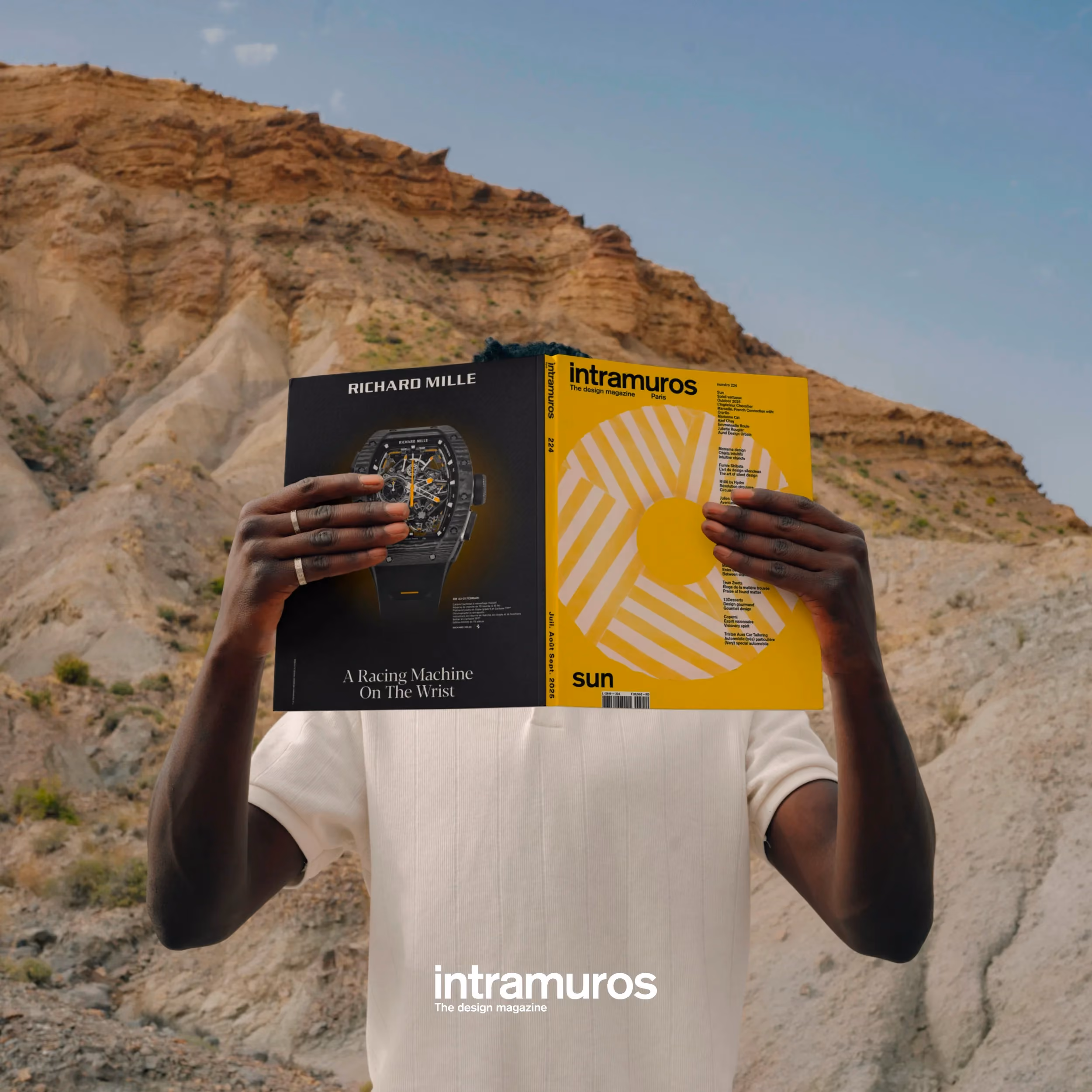 Intramuros magazine held by a man