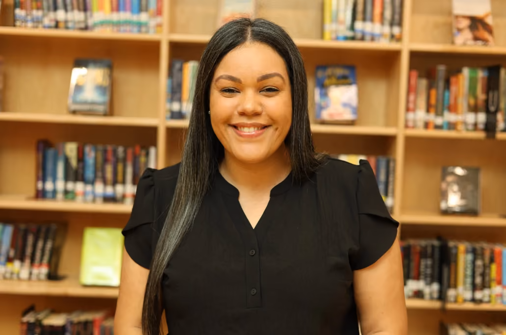 Smiling woman, library background










