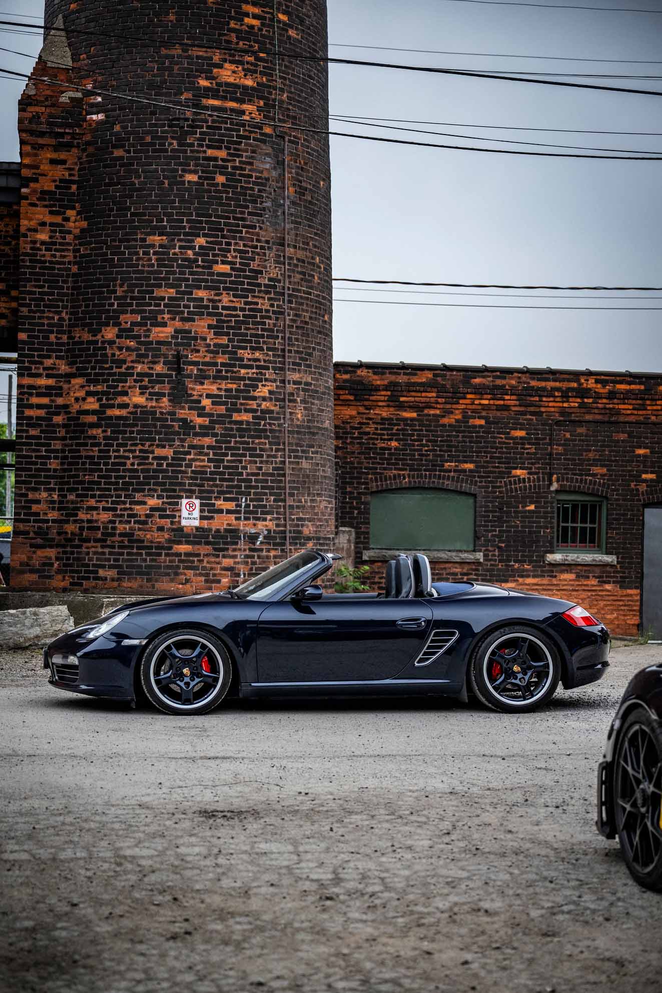 Photo of vehicle in front of brick building