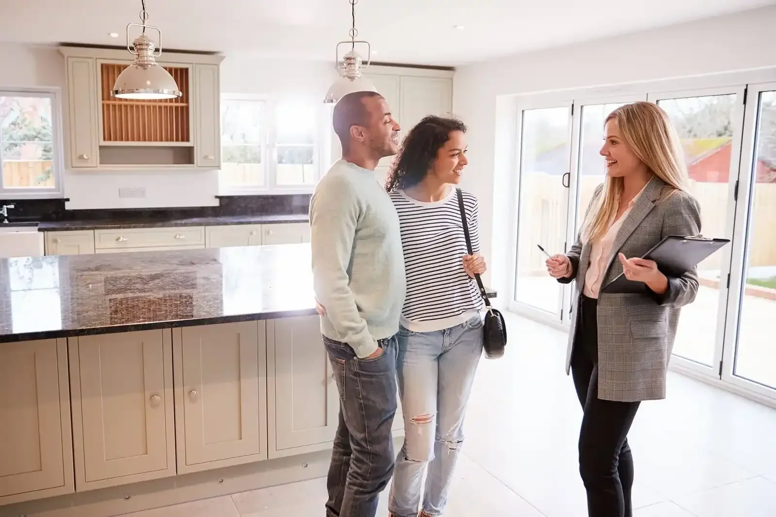 Realtor discussing home condition during foundation inspection consultation