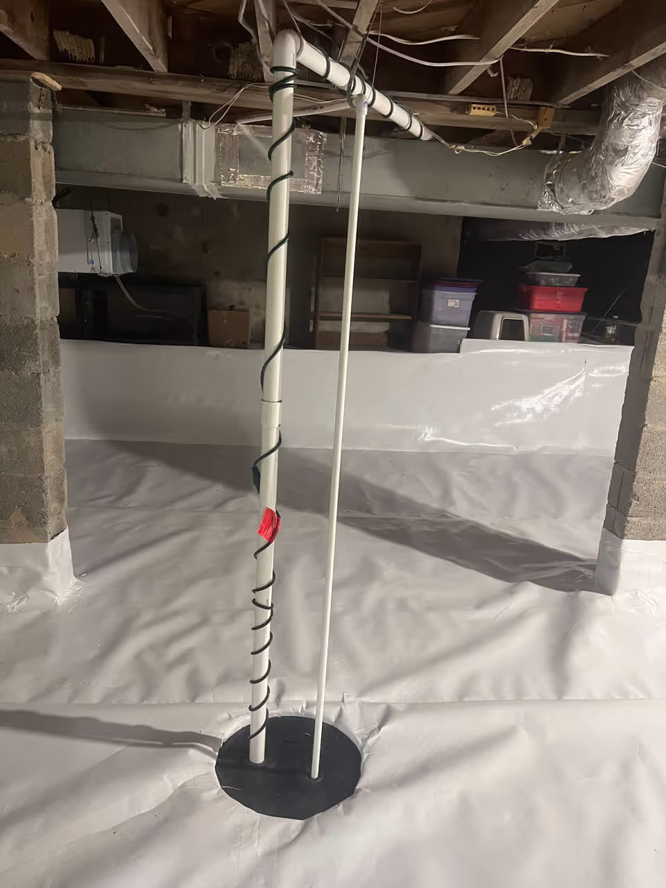 new sump pump installed during crawl space encapsulation job
