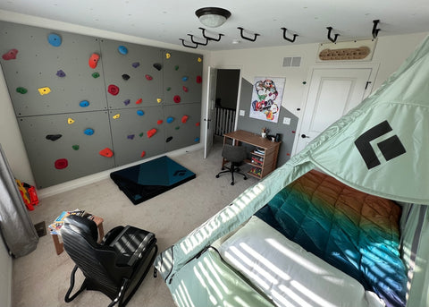 kids room with home climbing panels