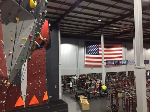 Rock climber climbs a wall