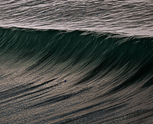 A rolling wave about to break.