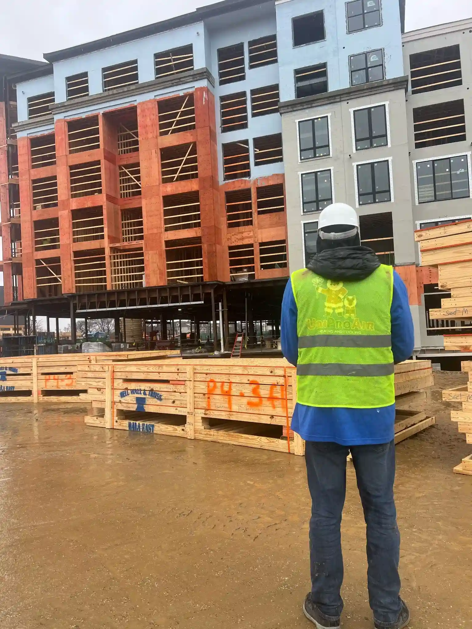 Man on the site surveying on the site