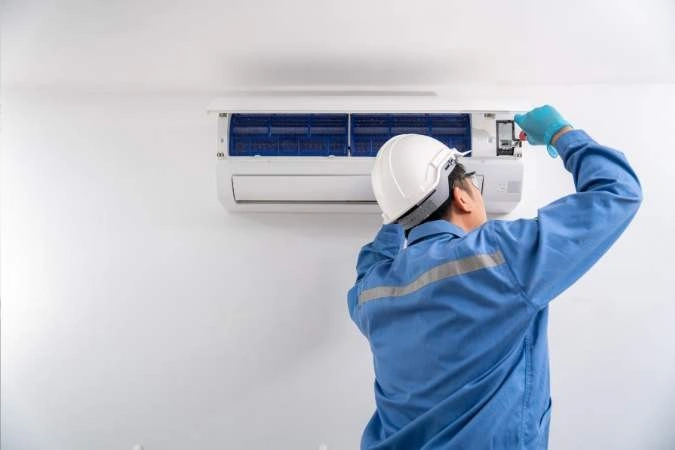 Installing indoor air conditioners.