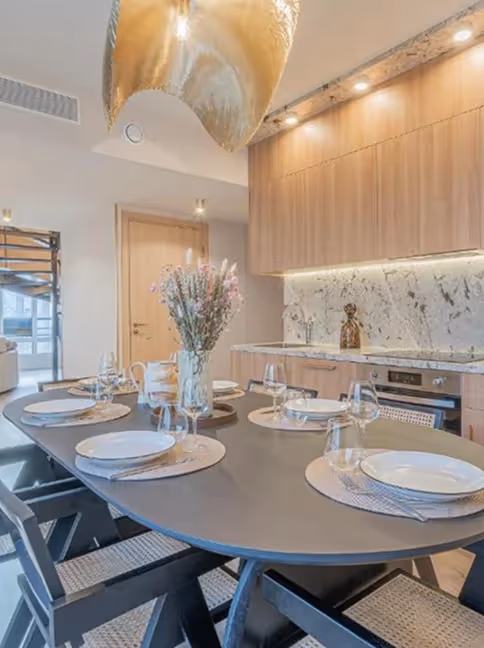 Table set in a furnished corporate housing apartment for a business stay, Yuna.