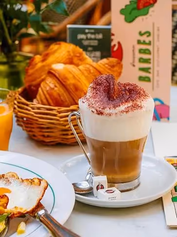 Café on the terrace at Barbes near a furnished apartment hotel for long-term rental, Yuna.