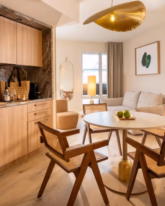 Comfortable living room in a furnished apartment for business stay and mobility lease, Yuna.
