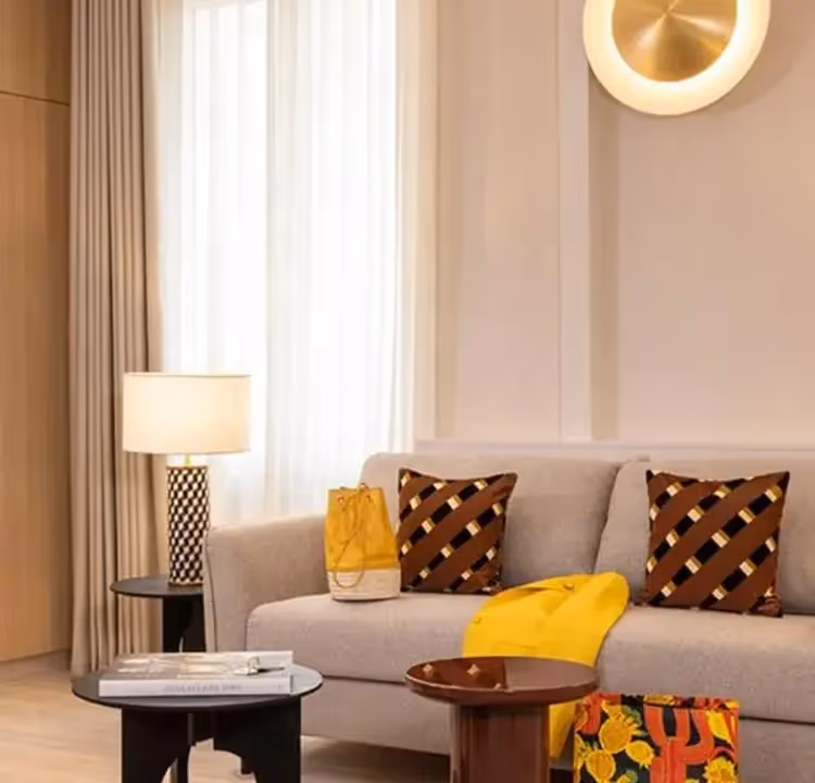 Apartment with comfortable living room at Yuna Saint-Honoré, ideal for a furnished rental in a hotel residence or a business stay.