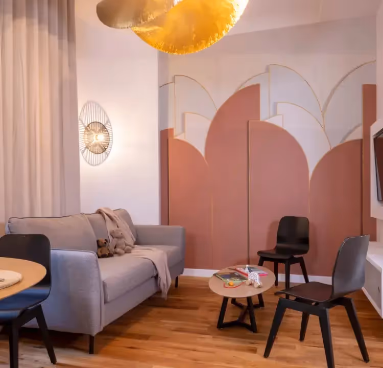 Living room space in an apartment at Yuna Blanche, furnished rental ideal for a hotel residence for a business stay or mobility lease.