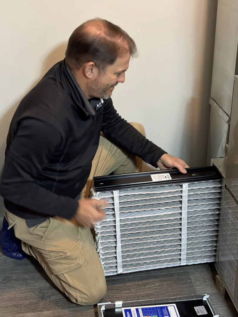 A well-insulated home in a residential neighborhood - standard vs high efficiency hvac comparison