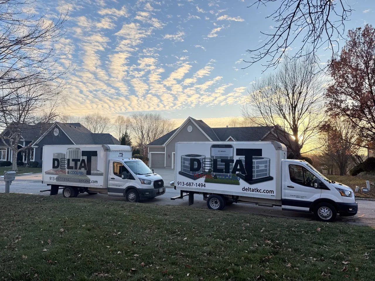 Real estate "Sold" sign in a front yard of a Kansas City neighborhood home - hvac replacement return on investment Real estate "Sold" sign in a front yard of a Kansas City neighborhood home - hvac replacement return on investment