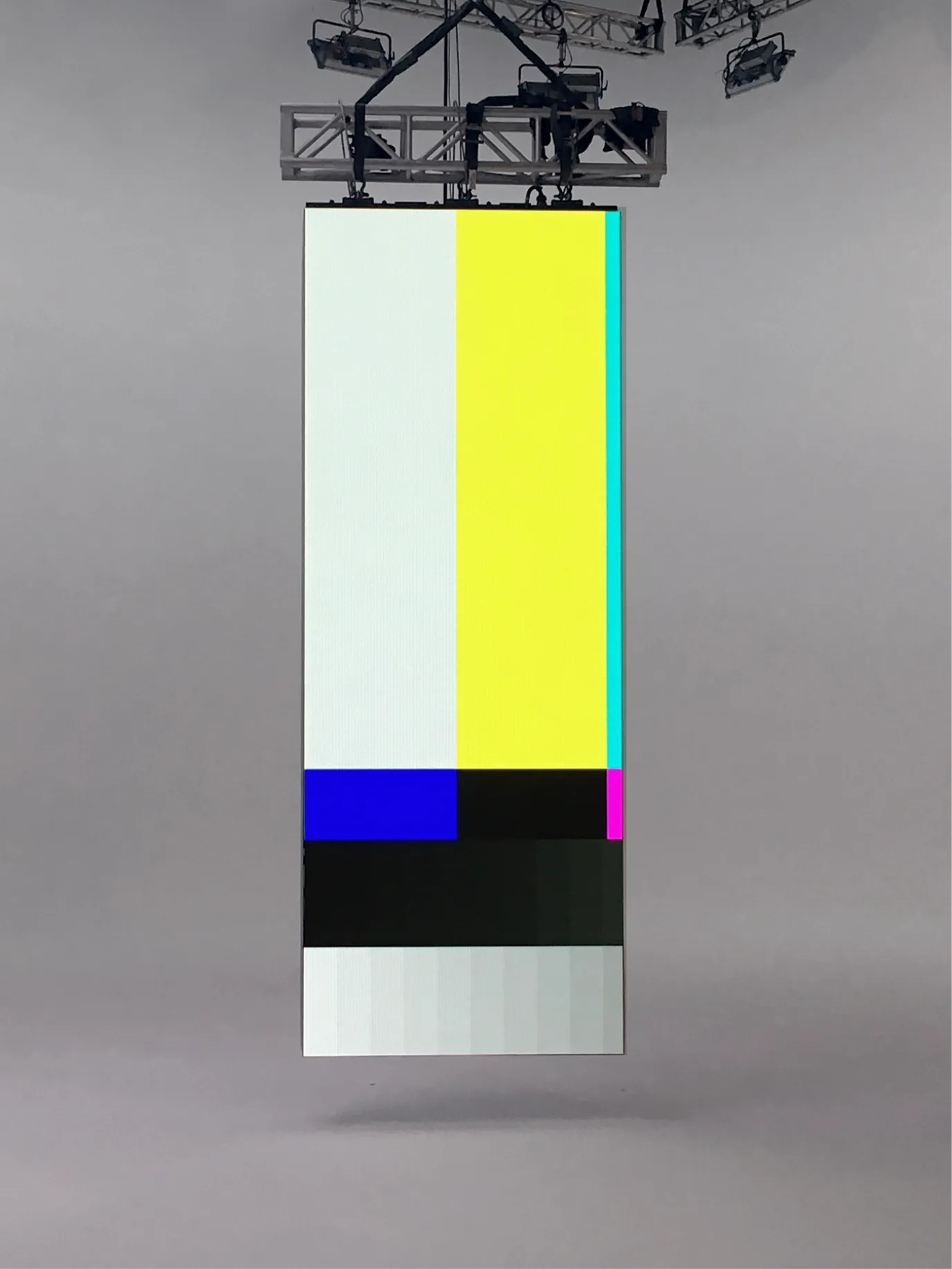 Hanging banner printed with TV colour bars in a studio