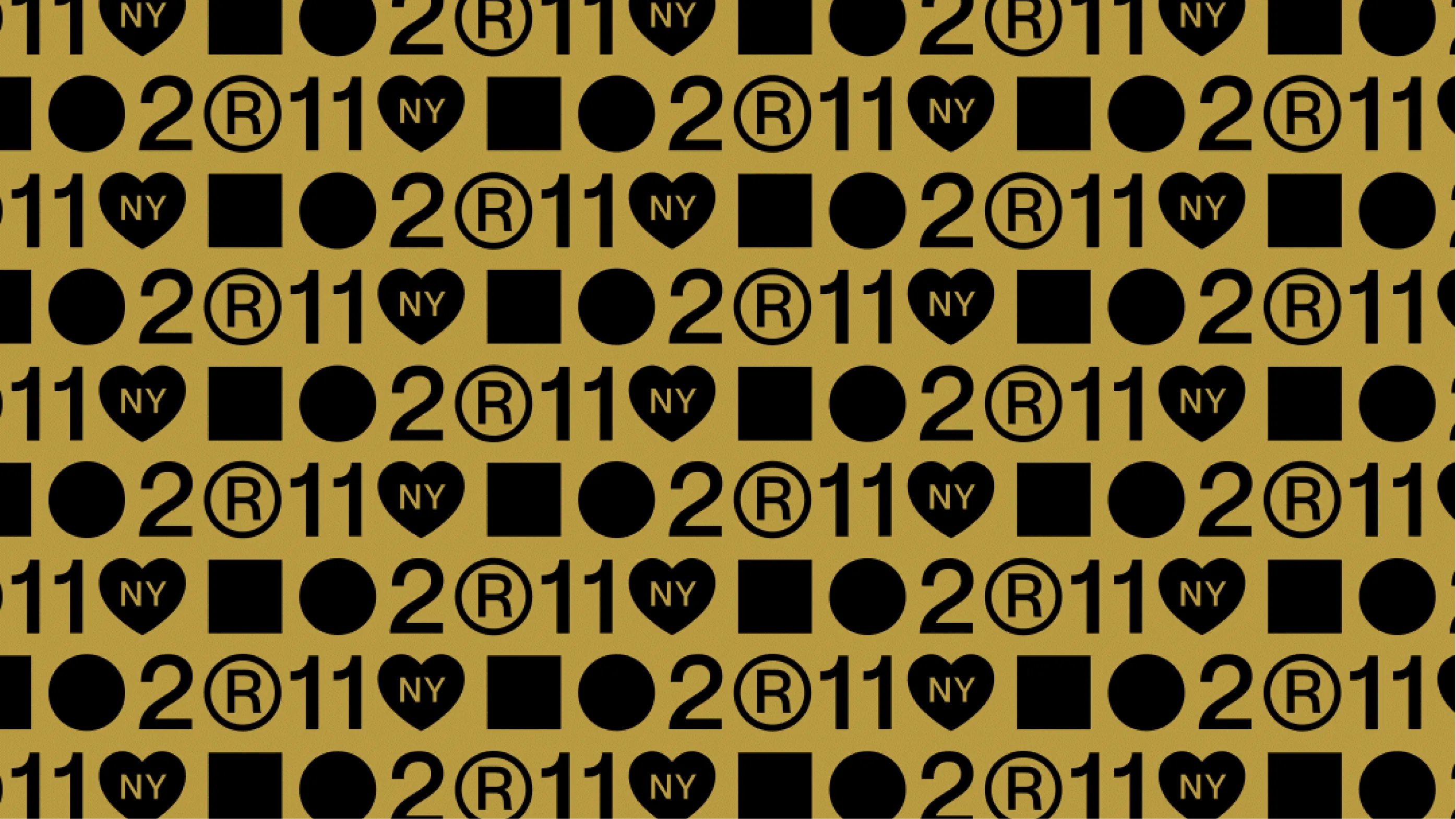 Repeating pattern of 2011, hearts and NY marks in black on gold
