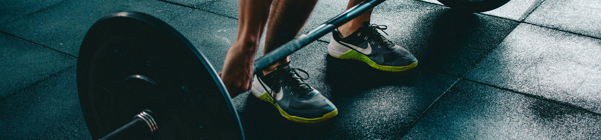 a person lifting a barbell