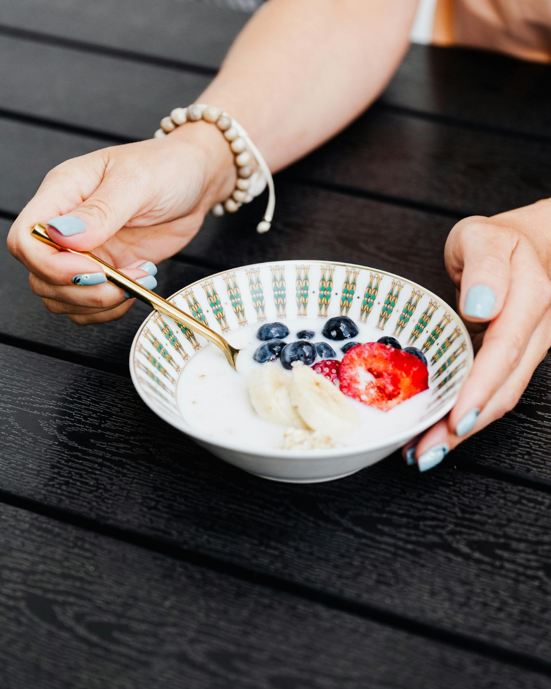 Yogurt and fruit prepared for a gut-health discussion