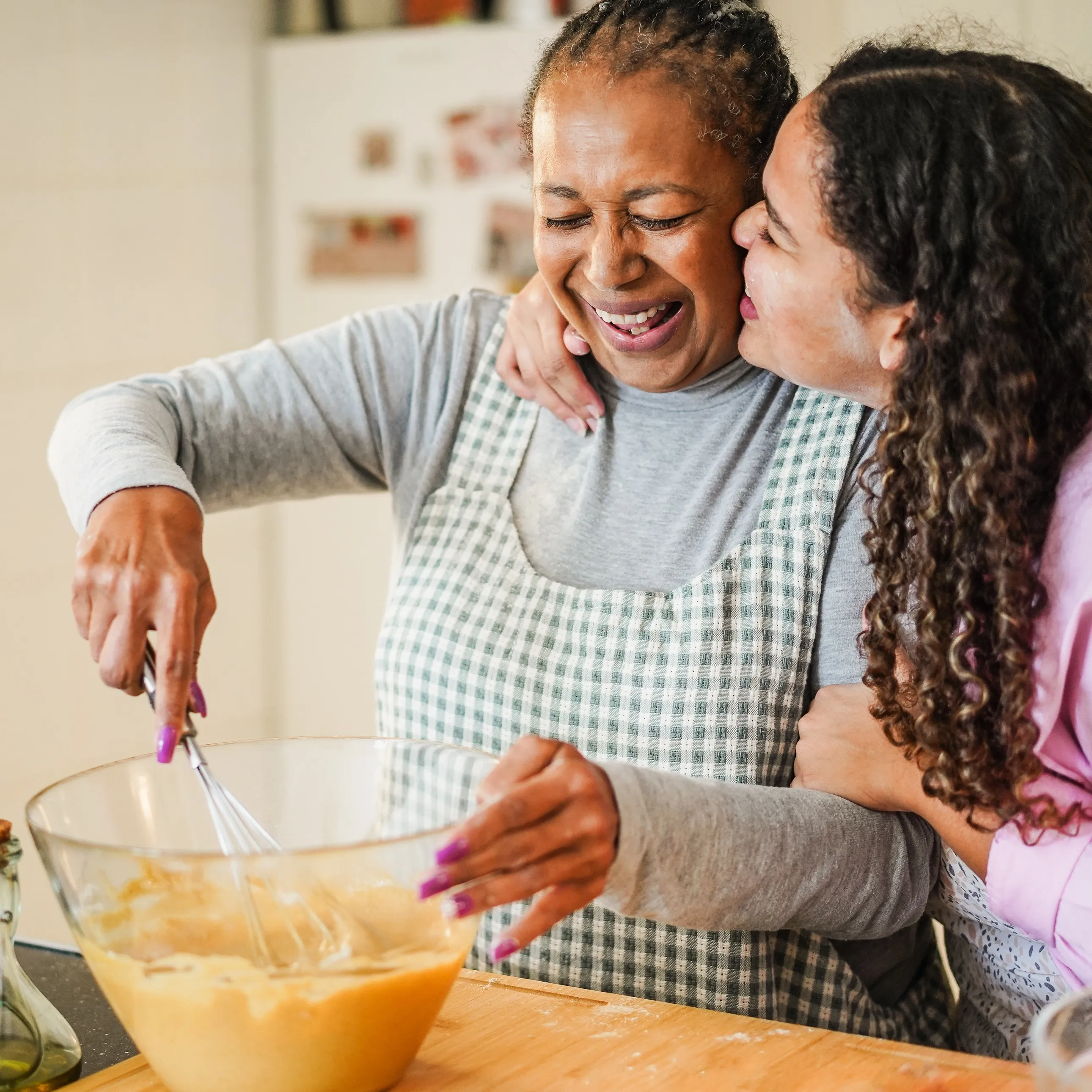Two women cooking