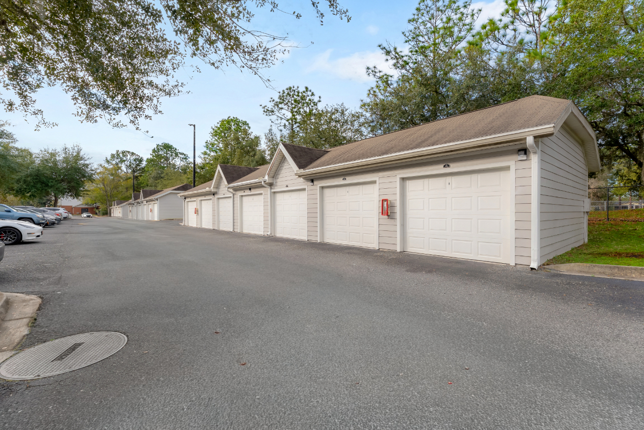 View of exterior of community garages at The Finley in Jacksonville, FL