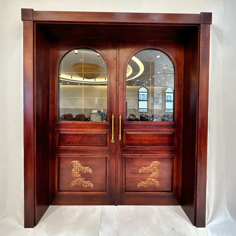 Large double synagogue entrance door with carved wood and glass panel