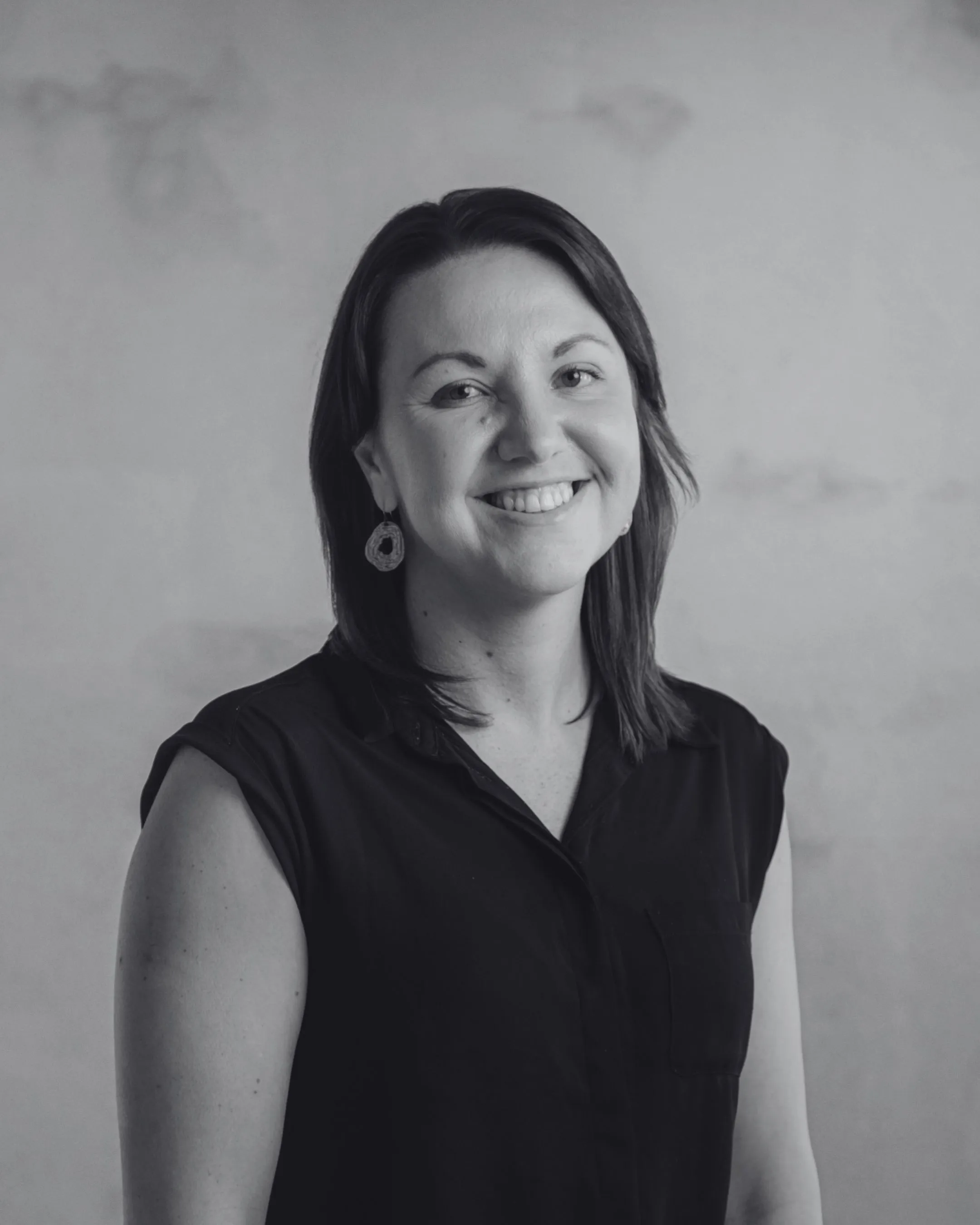 A professional headshot of Rosanna Dedecius