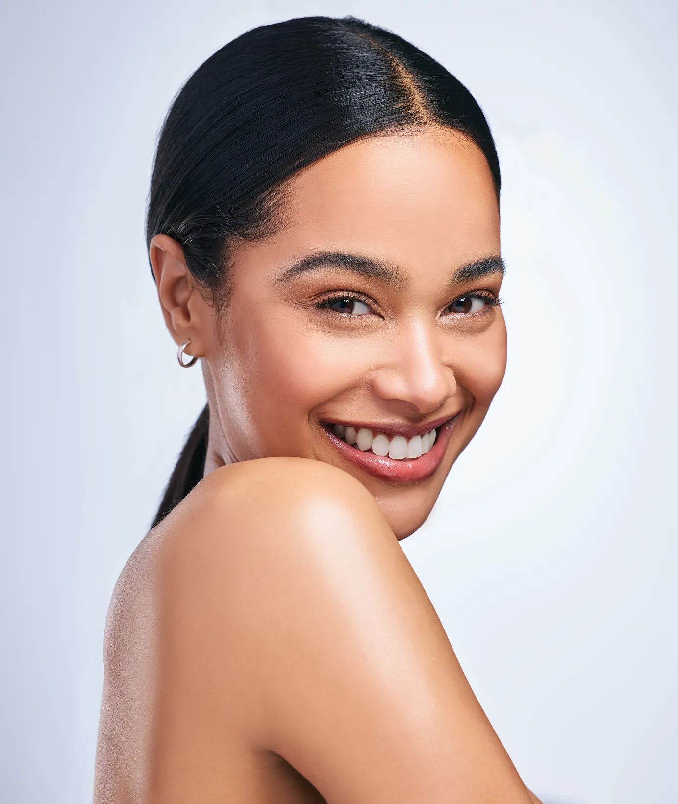 A woman with a smile on her face.
