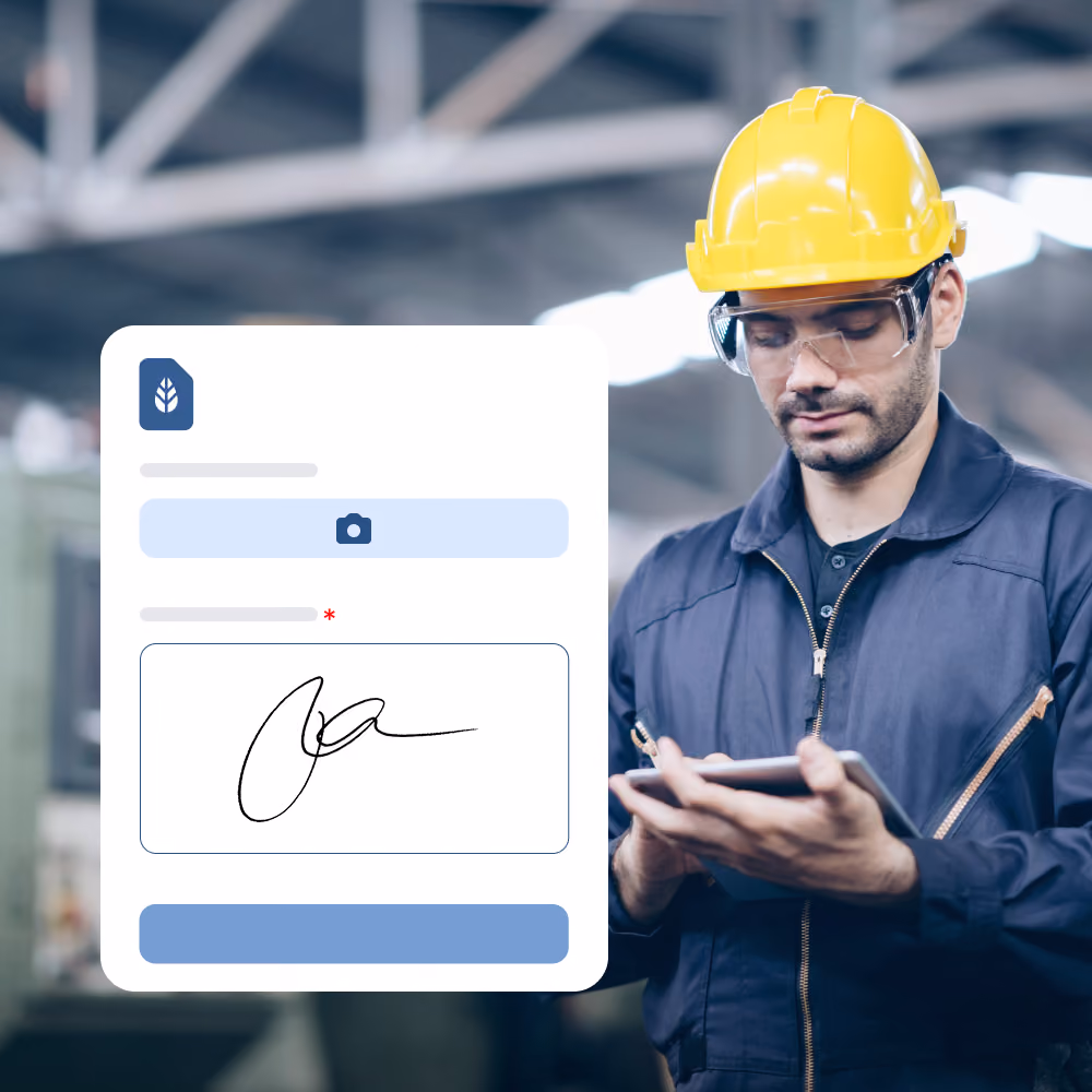 A man wearing a yellow safety helmet and safety glasses uses a tablet in an industrial setting, next to a digital form with a camera icon and an electronic signature field displayed on the left.