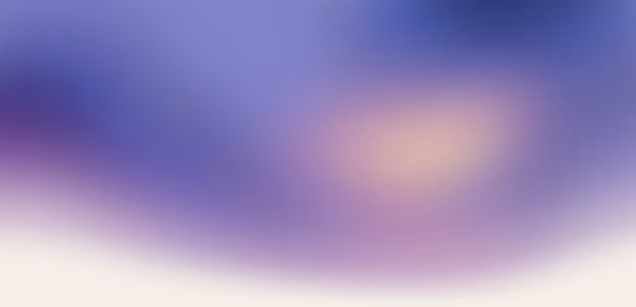 Gradient background with soft blends of purple, blue, and pink hues fading into white.