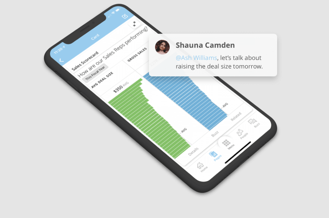 Smartphone displaying a sales scorecard with bar charts for average deal size and gross sales, and a chat bubble from Shauna Camden mentioning Ash Williams about discussing raising deal size.