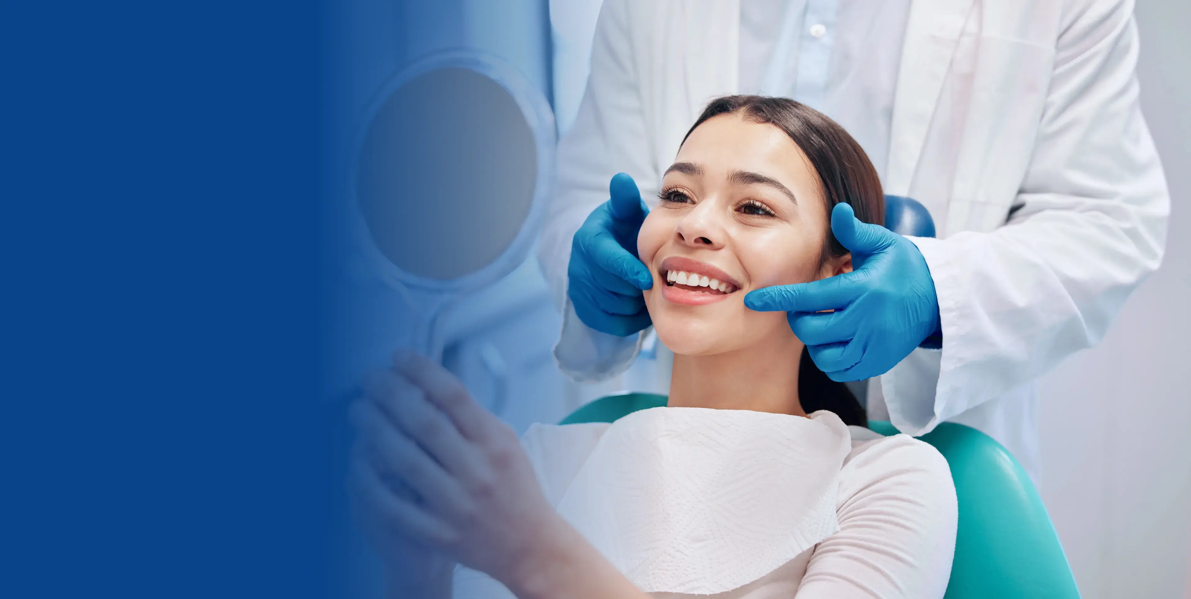 A woman getting her teeth checked by a dentist.