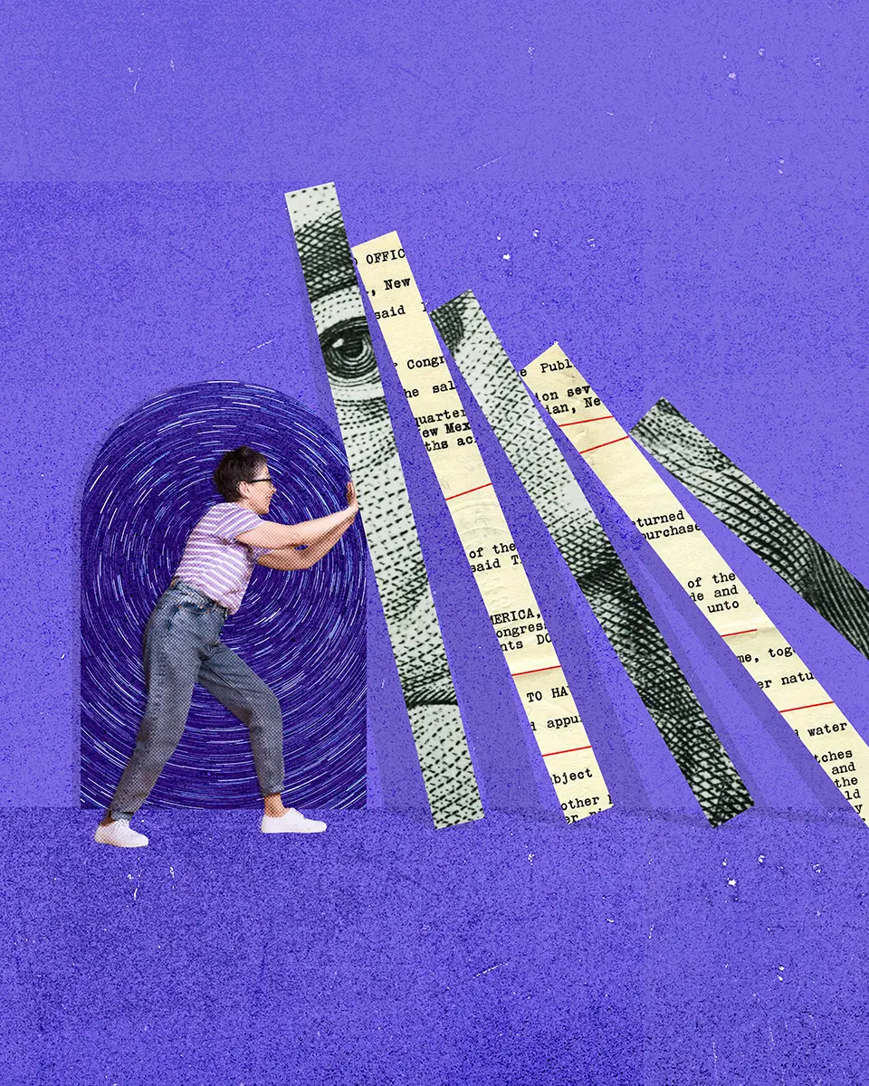 A title insurance escrow closer holding up money and documents representing risk mitigation