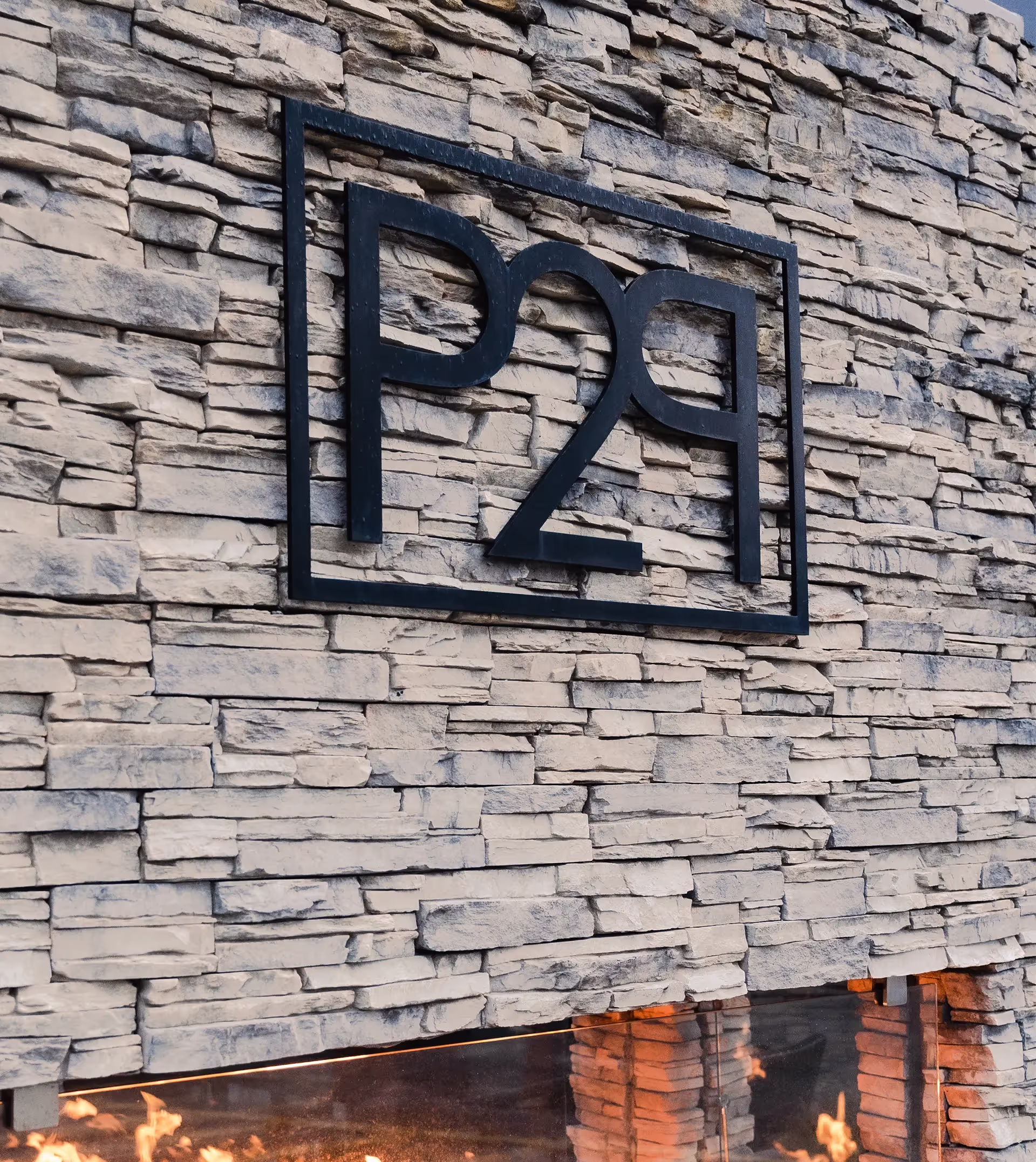 exterior dining patio with fireplace at prime29 steakhouse