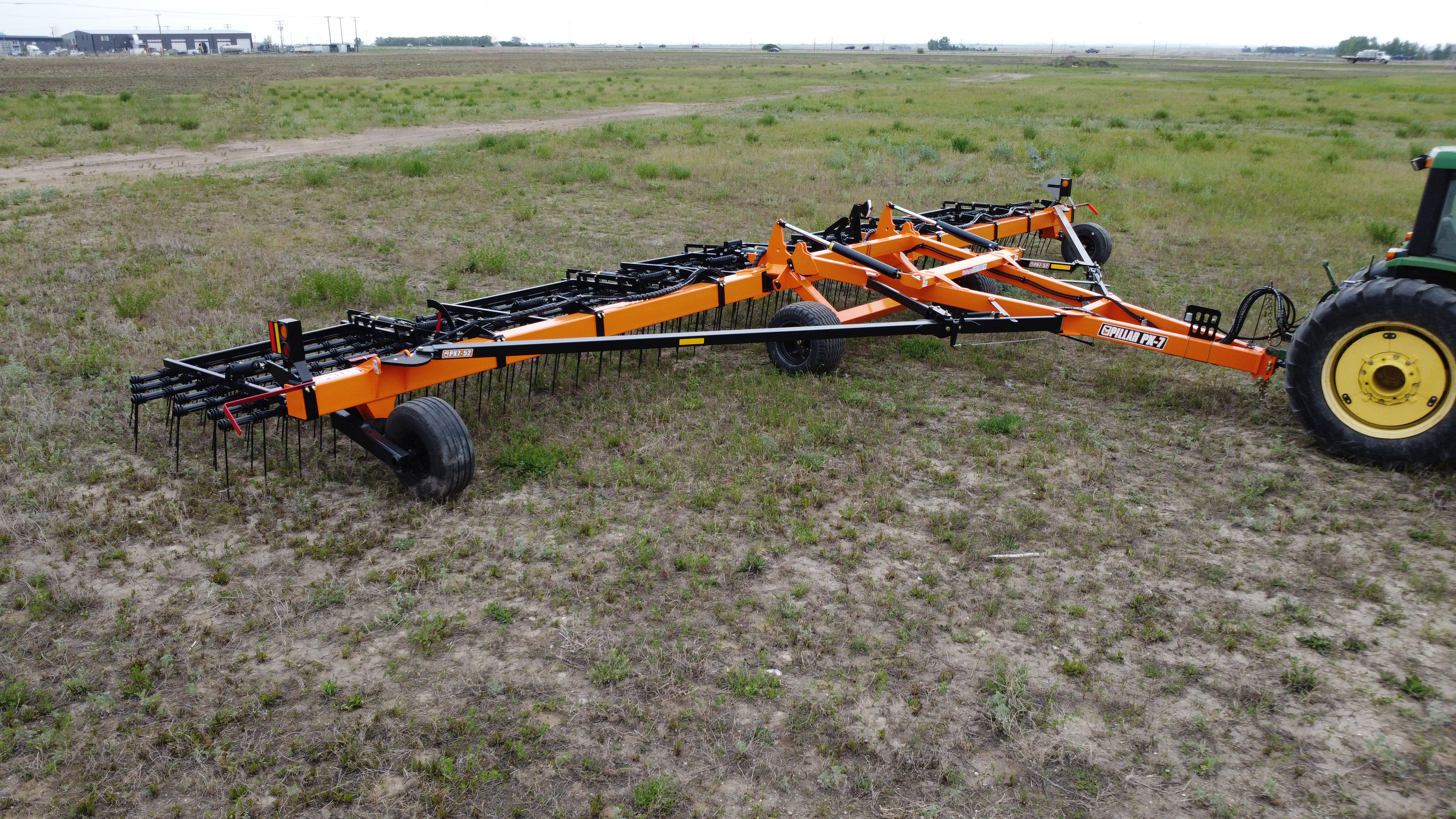 Harrow in the folded down position