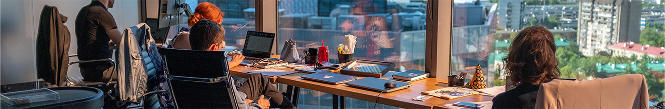 Office Workers By The Window