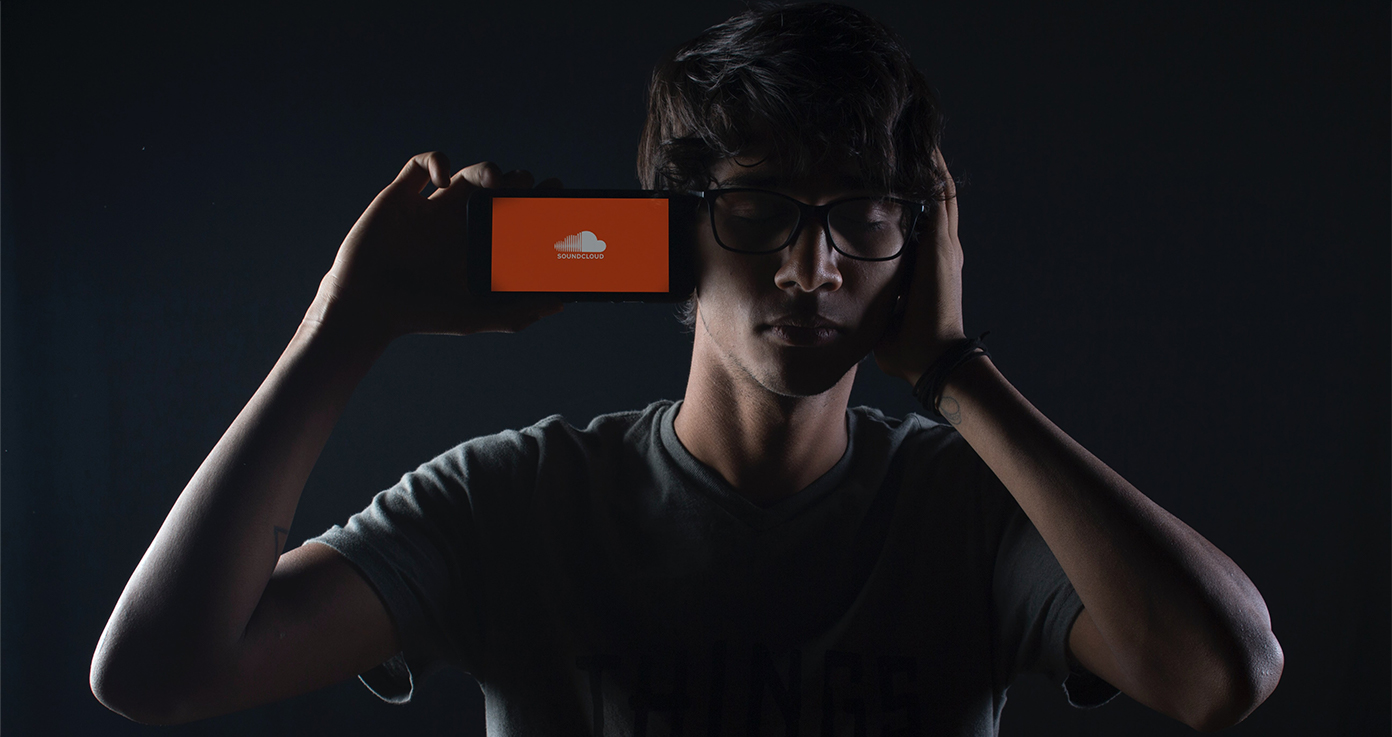 Person listening to SoundCloud on a mobile device