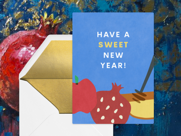 A Rosh Hashanah card featuring an apple and a pomegranate.