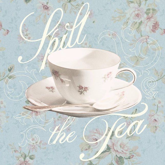 White teacup and saucer with pink flowers and a spoon on a blue floral background with text 'Spill the Tea'.