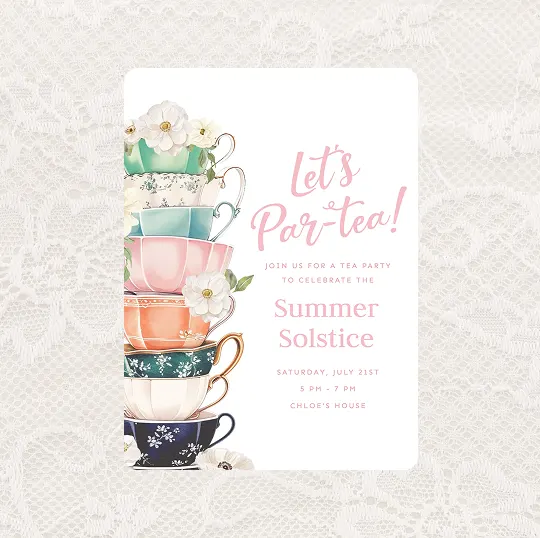 Invitation with stacked colorful teacups and flowers reading 'Let's Par-tea!' for a Summer Solstice tea party.