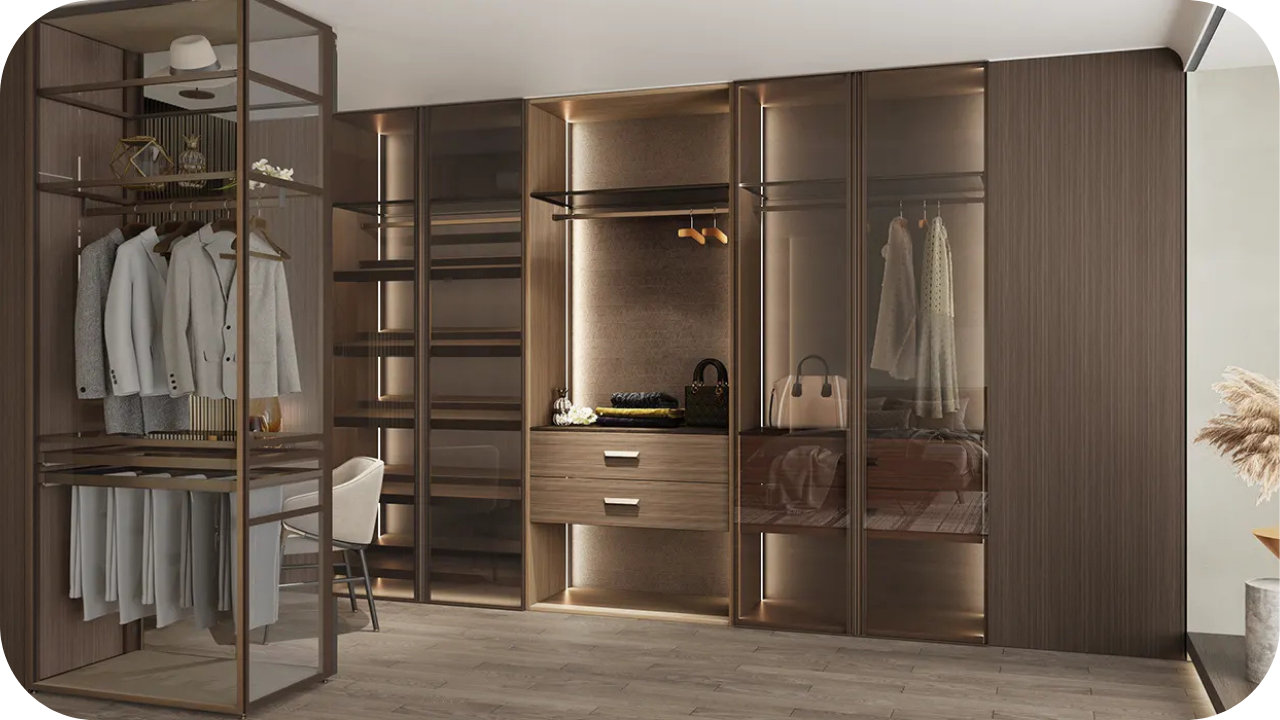 Luxury Melbourne joinery style with modern walk-in wardrobe, glass doors, open shelving, and built-in drawers.