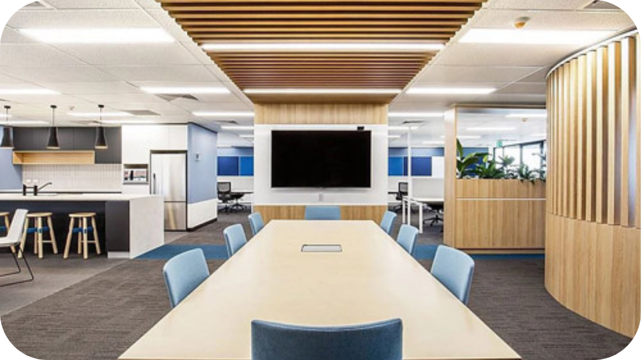 Contemporary office fit out with meeting room, timber accents, and modern joinery, highlighting key elements that create collaborative workspaces.
