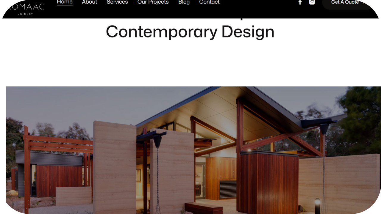 Modern home with timber cladding, concrete walls, and large glass panels showcasing contemporary architecture.