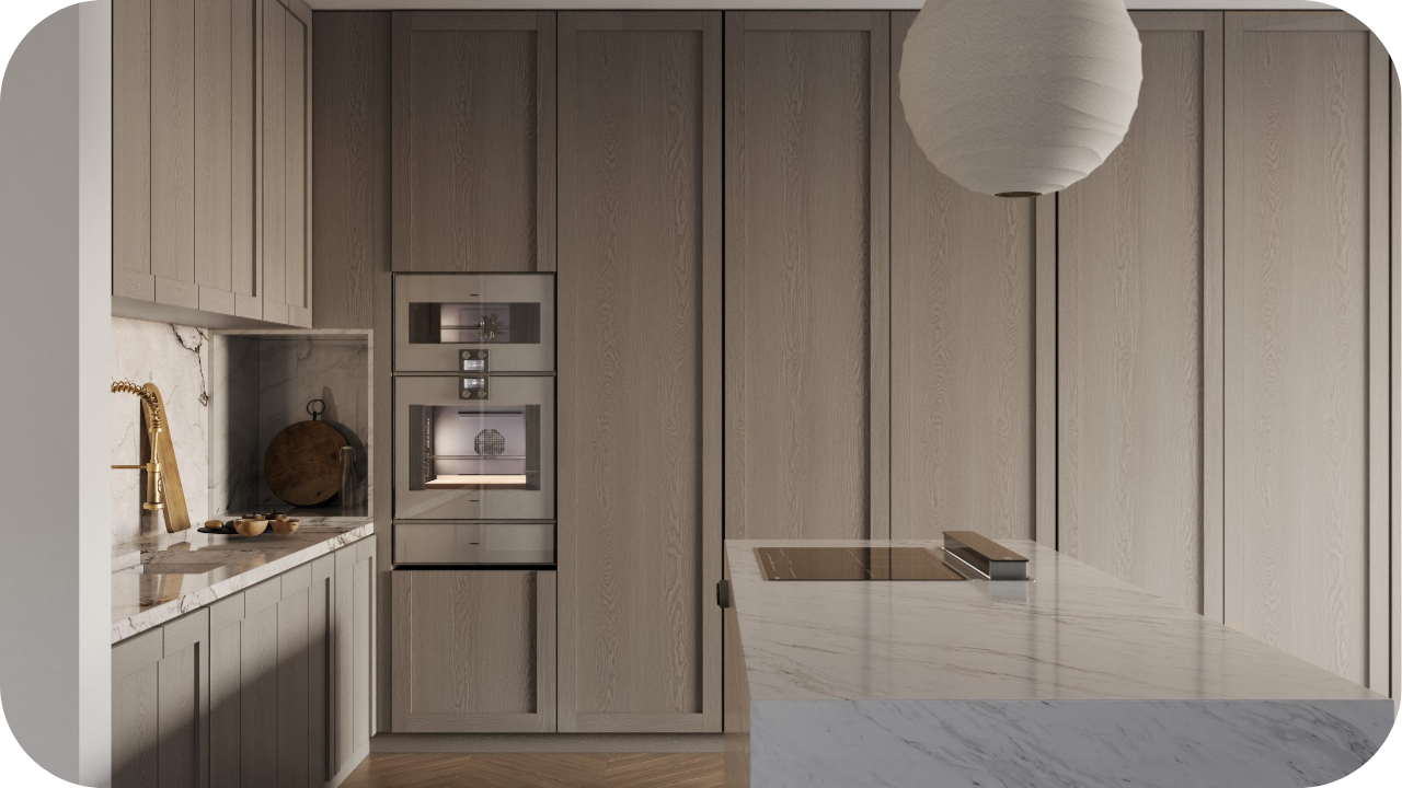 A premium kitchen with timber cabinetry, a marble island, and soft lighting demonstrating refined joinery techniques for pairing timber and stone beautifully.