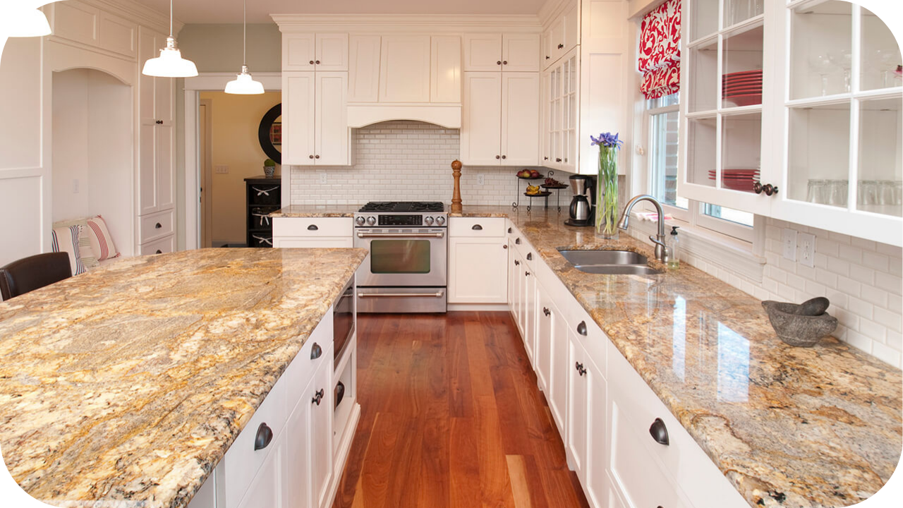 Bright kitchen with handcrafted white cabinetry and detailed benchtops showcasing how thoughtful joinery design supports style, function, and budget control.