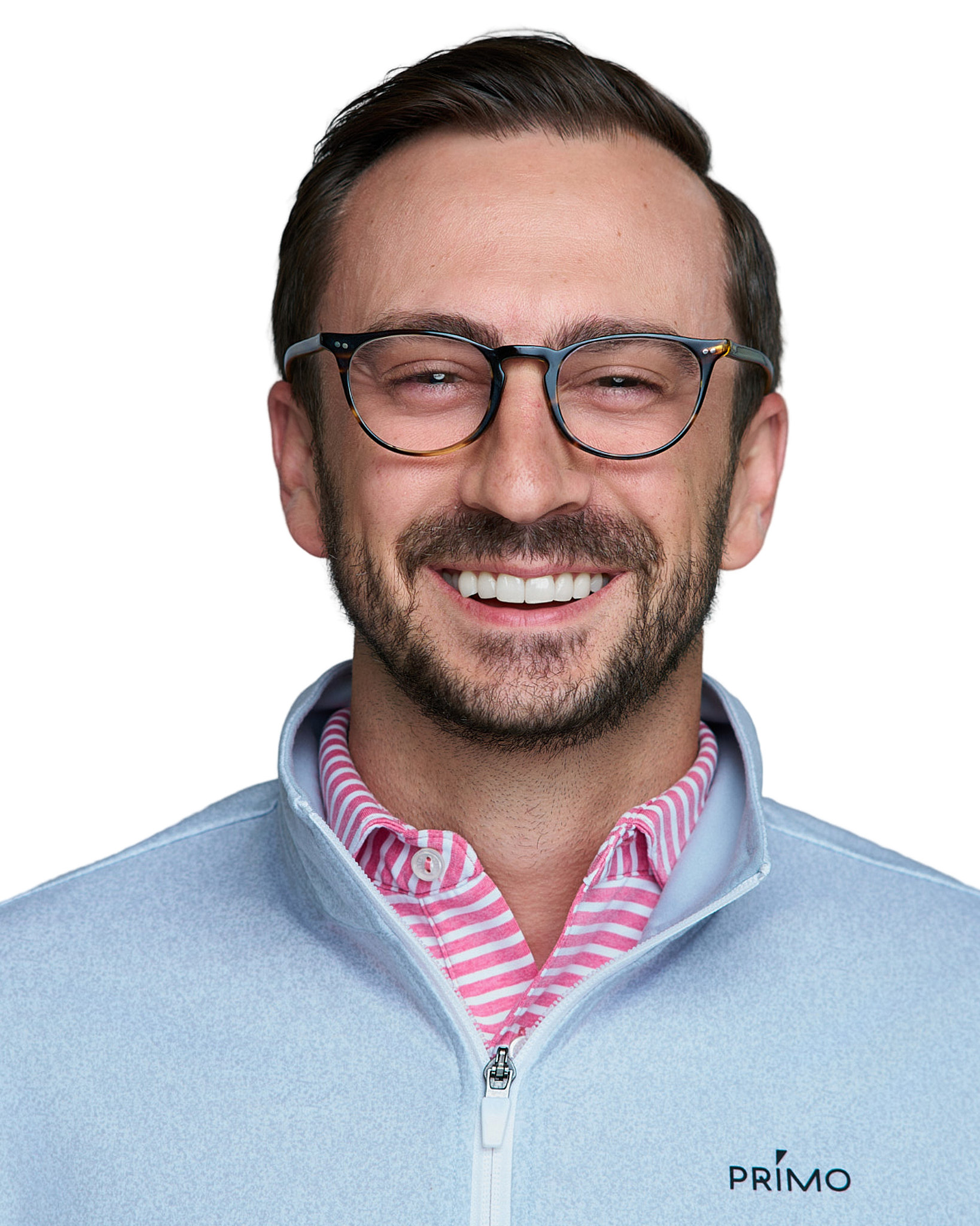 On-Location Corporate Headshots at On Site Headshots made for corporate group headshot session man with glasses and beard in a gray suit and white shirt.