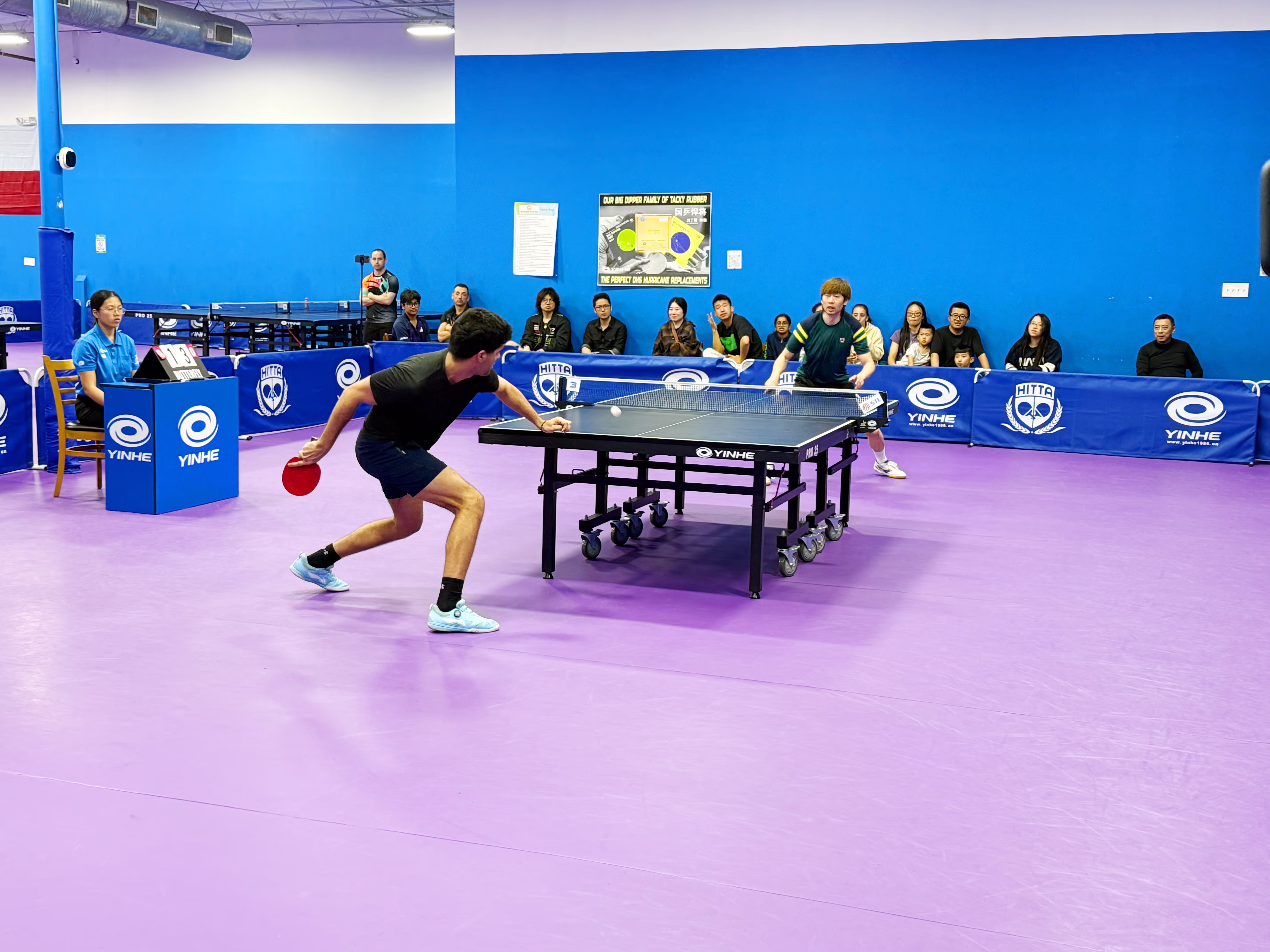 Players at table tennis event.